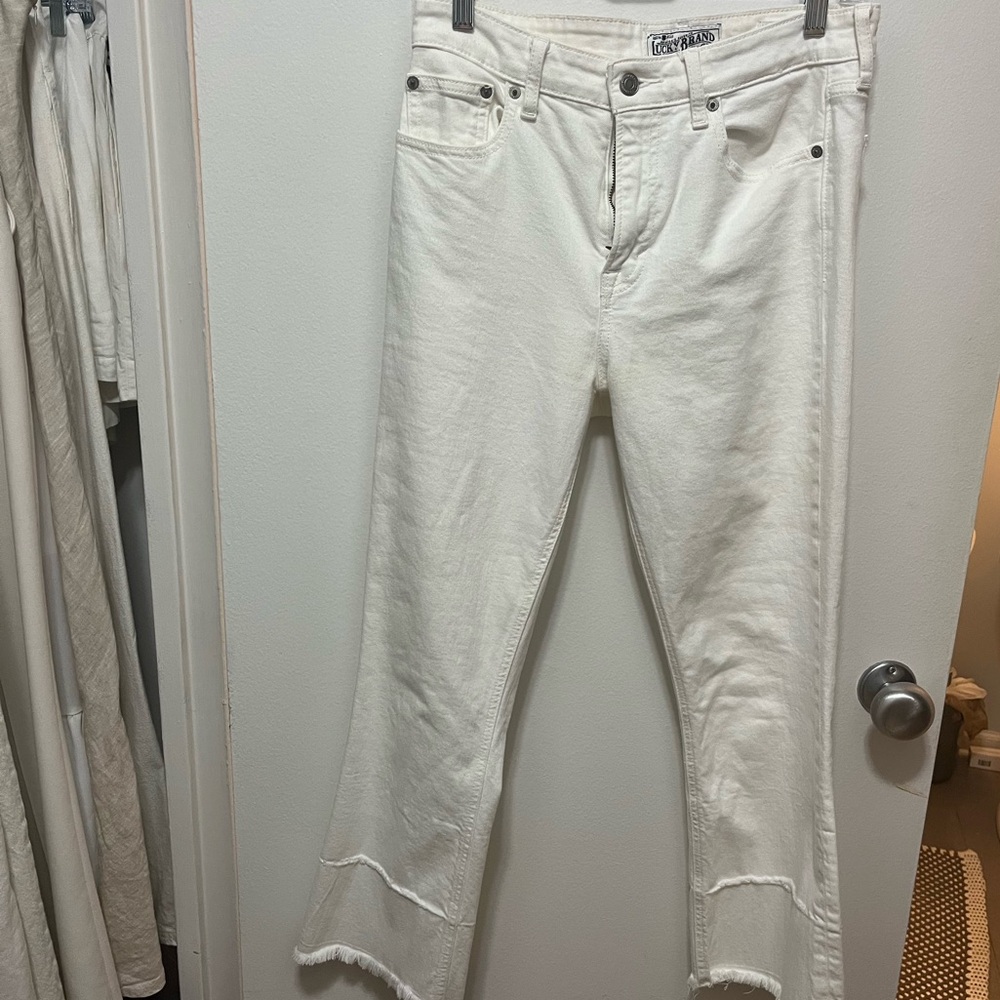 White jeans with cuffed detailing